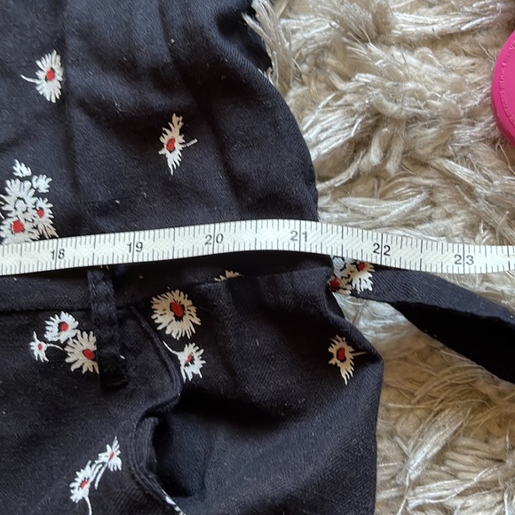 Logan Daisy Print Long Sleeve Cotton Jumpsuit In Black Multi - Picture 13 of 14